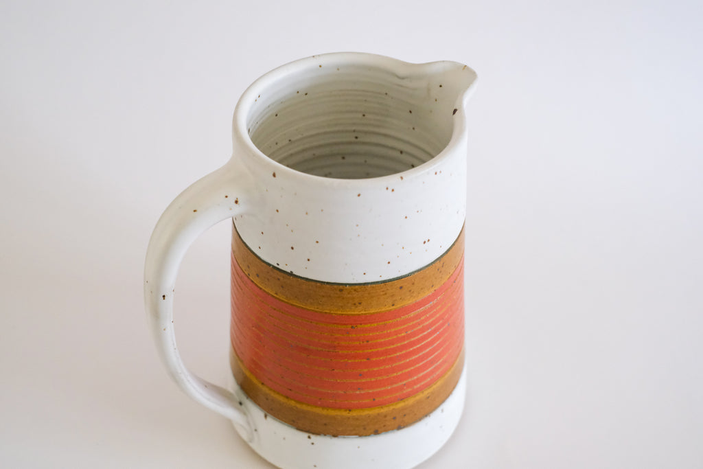 Pitcher in Red and Mustard