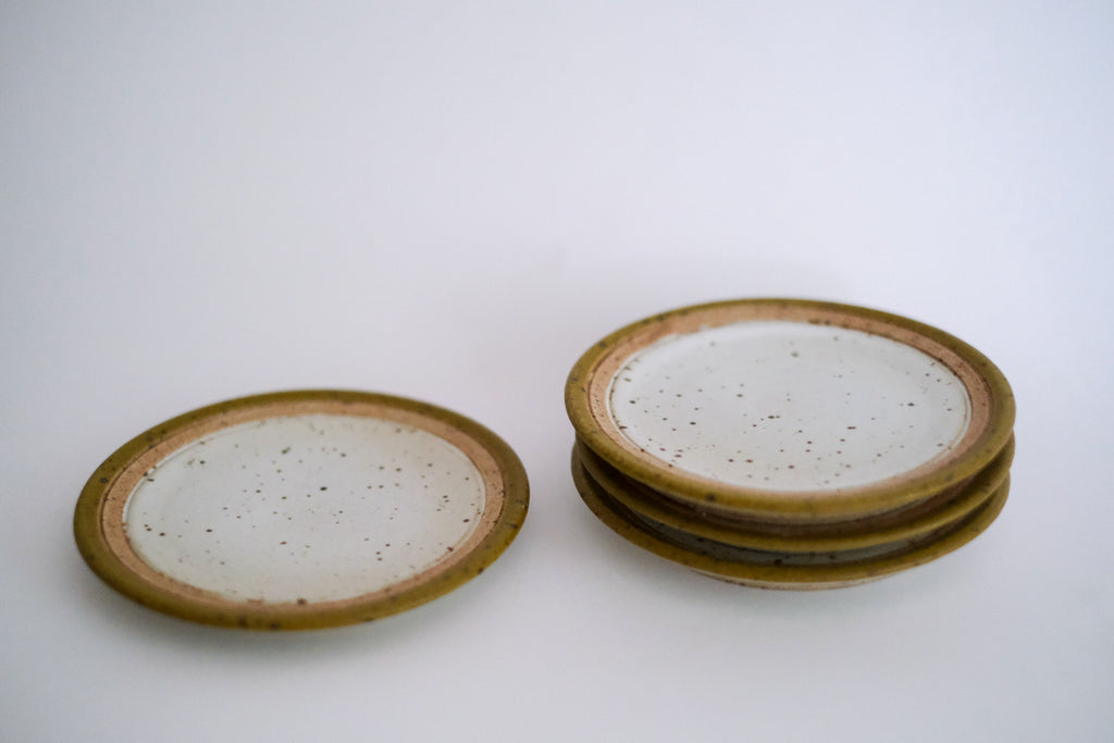Set of Four Small Plates in Modern Style